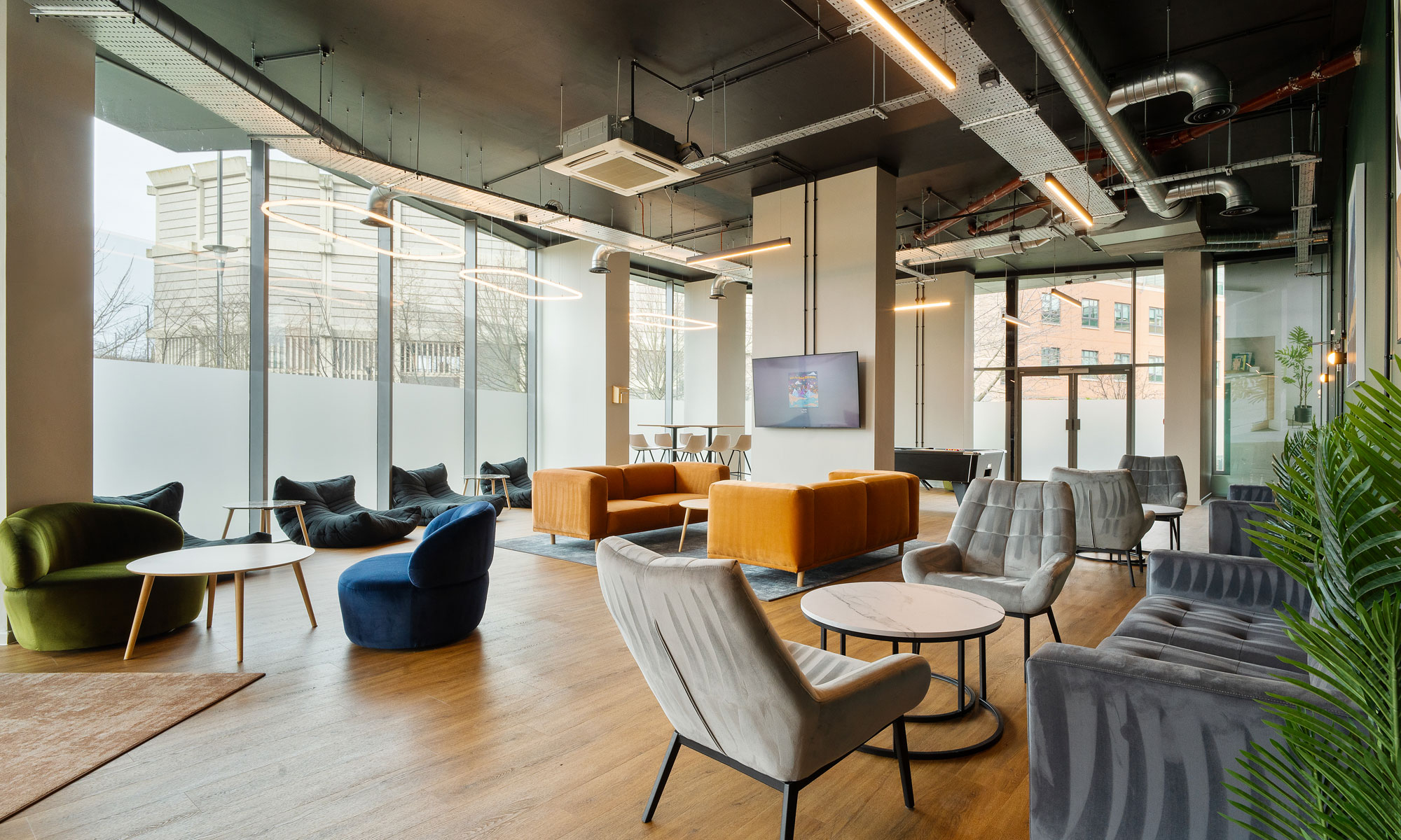 Secure cycle storage, private meeting spaces, co-working areas, and resident lounges